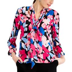 Kasper Adds Sophisticated Style To Your Wardrobe With This Floral-Print Blouse, Featuring A Bow Detail At The Neckline. Designed To Fit And Flatter 5'4" And Under Frame Bow Neckline Polyester Dry Clean Or Machine Washable Imported Web Id: 13668799 Elegant Multicolor Blouse For Work, Feminine Multicolor Blouse For Work, Spring Floral Print Formal Tops, Spring Formal Tops With Floral Print, Spring Formal Floral Print Tops, Formal Spring Tops With Floral Print, Elegant Multicolor Tops For Workwear, Sequin Shirt, Tie Neck Tops