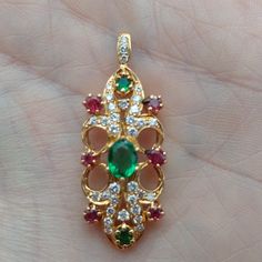 Smoke-Free Home. This Is A Pendant. Could Also Turn It Into A Brooch If You Would Like. It Has Two Round Emeralds At North And South. And Then It Has Four Rubies At The Four Corners. Has One Big Center Emerald. No Visible Flaws. The Emerald And The Center Is Probably A Carat. Surrounded By A Swirl Of Diamonds. And I Guess Probably Equates To Another Half A Carat. Beautiful Setting And 14 Karat Gold. Unusual. Bought It From An Estate Sale And Not Sure You Would Find Another One Like It. Macys Jewelry, North And South, Four Corners, The Four, Diamond Pendant, Estate Sale, Womens Jewelry Necklace, Swirl, Gold Color