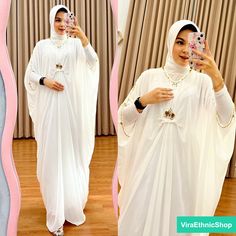 - 1 Pcs Kaftan - 1 Pcs matching inner for free - 1 Pcs Turban Kaftan Specifications: - Model: Kalong, wave design - Matterial kaftan: Cerutty babydoll + EXCLUSIVE sequins (CERUTTY GRADE A) - Size: Freesize fit to XXL - Shirt length: +- 140 cm - Bust: +- 140cm - Nursing mothers: No Inner specifications: - Inner sleeved gamis with straight stitching - Material: Stretch Spandex (Stretchy) - Size: Freesize (fits XXL) - Clothes length: +- 125 cm - Chest Width:+- 100 (Stretchy) - Hand Length: +- 44 cm White Long Abaya For Evening, Long White Abaya For Evening, White Long Abaya For Party, White Elegant Free Size Dress, Elegant White Free Size Dress, White Evening Abaya For Eid, White Abaya For Evening Eid Festival, White Beach Dress For Eid, Elegant White Summer Abaya