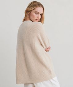 Cashmere Cocoon Cardigan Oatmeal Our favorite slouchy cardigan in luxuriously soft, lightweight, pure cashmere. A dramatically oversized body and the perfect relaxed fit make it ideal for layering. Trust us when we say: you'll never want to take this off. 100% cashmere. Made in China of Mongolian cashmere. Lightweight, super-soft knit. Faux-horn buttons. | Jenni Kayne Women's Cashmere Cocoon Cardigan Sweater Size Large Cream Cashmere V-neck Cardigan, Cream Fine Knit Outerwear For Fall, Oversized Neutral V-neck Sweater, Beige Cashmere Fine Knit Outerwear, Beige Fine Knit Cashmere Outerwear, Beige Cashmere Cardigan For Layering, Neutral Cashmere Cardigan For Winter, Beige Cashmere Sweater Coat For Spring, Oversized Fine Knit Beige Sweater