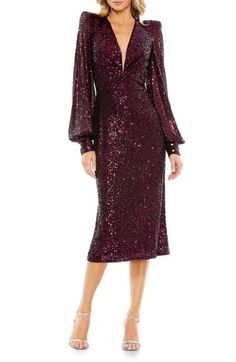 Glistening sequins enliven a scene-stealing midi dress framed by pronounced shoulders with long blouson sleeves. 48 1/2" length Deep V-neck Long sleeves Lined 100% polyester Spot clean Imported Asian Owned/Founded Short Wedding Guest Dresses, Vestidos Color Coral, Cocktail Midi Dress, Elegant Cocktail Dress, Puff Sleeve Midi Dress, Unique Prom Dresses, Sequin Party Dress, Short Cocktail Dress, Midi Cocktail Dress