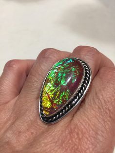 Large dichroic art glass Vintage ring Low content silver not sterling. All rings are shipped in a nice gift box. Check out our over a THOUSAND great reviews Engraving is $4 per letter and is not always perfect depending on the piece. It can take a few days if the jeweler is busy. This is payable to Paypal Judithsltd@gmail.com Artistic Multicolor Jewelry For Formal Occasions, Artistic Multicolor Jewelry For Formal Events, Artistic Multicolor Formal Jewelry, Collectible Iridescent Cabochon Jewelry, Unique Oval Iridescent Jewelry, Unique Iridescent Oval Jewelry, Multicolor Polished Finish Rings For Gift, Multicolor Opal Gemstone Ring Gift, Multicolor Polished Rings As A Gift