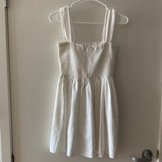 White Linen Smocked Mini Dress New Without Tags. Never Been Worn. Size Small But Fits S-M Very Flattering Fit, Comfy Straps, And Double Lined, Perfect For Picnics Or Vacation. Summer Smocked Ruched Cotton Dress, Fitted Sundress With Smocked Back For Daywear, Day Out Sundress With Gathered Waist, Cotton Smocked Summer Dress, Flowy Cotton Mini Dress With Smocked Back, Summer Fitted Sundress With Gathered Waist, Summer Cotton Sundress With Gathered Waist, Ruched Cotton Smocked Sundress, Fitted Summer Sundress With Gathered Waist