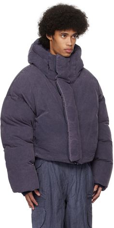 Down-filled quilted enzyme-washed cotton canvas jacket. · Bungee-style drawstring at hood and hem · Funnel neck · Zip closure with velcro placket · Welt pockets · Dropped shoulders · Inset rib knit cuffs · Zip pocket at interior · Fully lined Supplier color: Indium Fill: 90% duck down, 10% feather. Entire Studios Puffer, Puffer Jacket Design, Entire Studios, Puffer Jacket Style, Heavy Winter Coat, Bubble Coat, Winter Puffer Coat, Winter Jacket Women, Winter Puffer Jackets