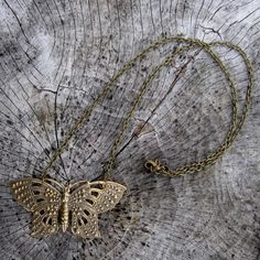 Large ornate oxidized brass Victorian butterfly measuring about 57x32mm. On 16 inches of antiqued brass chain. Handmade Gold Bohemian Butterfly Necklace, Gold Butterfly-shaped Brass Jewelry, Gold Butterfly Shaped Brass Jewelry, Vintage Handmade Butterfly Necklace, Gold Bohemian Butterfly Necklace, Bohemian Gold Butterfly Jewelry, Bronze Brass Filigree Necklace, Gold Nickel-free Butterfly Necklace, Nickel Free Gold Butterfly Necklace