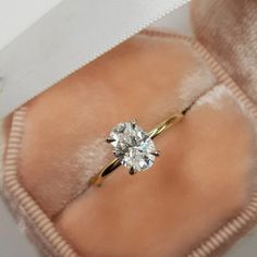 an engagement ring with a diamond in it