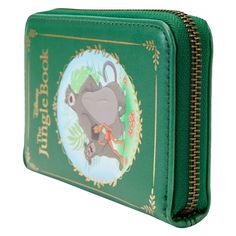 This beautiful interpretation of a Disney classic book features a “front cover” with gold foil lettering. Cherished characters gather in the jungle, including Mowgli, Baloo, and Bagheera. On the back, Shere Khan shows off his claws, and Kaa is coiled around Mowgli. Inside the wallet, you’ll find 5 slots for holding cards and 1 clear slot for displaying your ID. A die-cut shape of a leaf adds a nod to the jungle setting. This wallet is an officially licensed Disney product. Dimensions: 6”W x 4”H Money Purse Wallets, Jessie Characters, Mogli Jungle Book Disney, Jungle Book Elephant, Jungle Book Loungefly, Bear Necessities Jungle Book, Endangered Elephants, Disney Wallets Loungefly, Jungle Book Disney