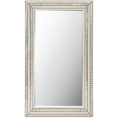 a large mirror on a wall with a white border around the edge and a silver frame