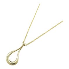 This is part of Chairish’s Fine Jewelry assortment.  TIFFANY&CO Teardrop Necklace Necklace Gold K18 (Yellow Gold) Gold   General     Brand :  Tiffany     Design     Type :  Necklace     Material :  Yellow gold     Color :  Gold     Gender :  Women     Size     Size :  Neck rotation:40cm(15.7")Motif W:10mm x H:20mm(0.4" x 0.8")    Condition     Condition :  Used (very good)     Ranking :  Rank A Used - A few traces of usage, some scratches / dirt can be seen but overall in very good condition     Condition Notice :  Before purchasing, please refer to the images for the exact condition of the item.  We cannot confirm the time period listed.  A return request must be submitted within 48 hours after delivery. Customer is responsible for return shipping costs and fees. Estimated return shipping Yellow Gold Color, Necklace Necklace, Teardrop Necklace, Time Period, Gold Gold, Necklace Gold, Tiffany & Co., Shop Necklaces, Gold Color