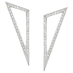 Keep your look on point with these triangle form earrings. The refined shape sparkles with light catching diamonds. 18K White Gold Diamond TCW is 2.20 Friction post and back closure Length is 2 inches and width is 0.65 inches. Minimalist Shapes, Noble Lady, Modernist Architecture, Cool Ear Piercings, Triangle Earrings, Emphasis, Pierced Ears, Yellow Rose, White Gold Diamonds