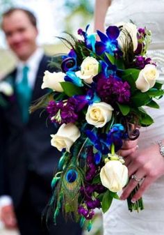 a bride and groom standing next to each other