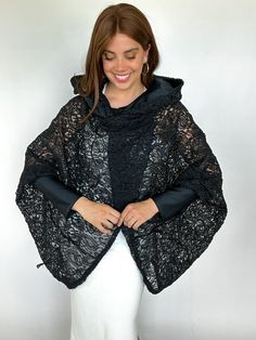 Description: Introducing the Sophie Wrap, crafted with a beautiful black lace fabric. This fabric offers exceptional flow and breathability, making it perfect for hotter climates. Unique and stylish, it is ideal for layering and adding a touch of elegance to any outfit. Features: Beautiful Black Lace Fabric: Elegant and breathable with exceptional flow. Comfort in Hotter Climates: Lightweight and airy for all-day comfort. Versatile Styling: Perfect for layering over dresses, pairing with shorts, Black Lace Top For Layering, Chic Lace Outerwear For Party, Chic Lace Outerwear With Lace Trim, Black Lace Top For Fall, Fall Lace Top For Layering, Elegant Lace Outerwear With Lace Trim, Elegant Lace Outerwear With Lace Sleeves, Elegant Outerwear With Lace Sleeves, Crochet Lace Top For Fall