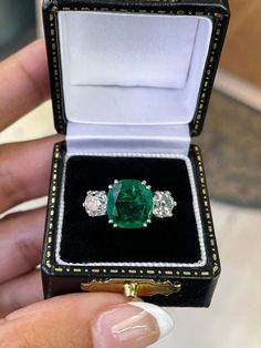 Luxury Emerald Ring With Three Stones And Radiant Cut, Luxury Three Stone Radiant Cut Emerald Ring, Luxury Radiant Cut Three Stone Emerald Ring, Three Stone Cushion Cut Ring, Gift Emerald Ring With Three Stones In Radiant Cut, Classic Emerald Ring With Three Stones And Radiant Cut, Classic Three Stone Radiant Cut Emerald Ring, Classic Radiant Cut Three Stone Emerald Ring, Emerald Ring Engagement Diamond