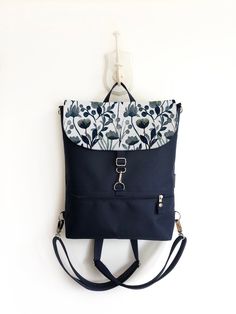 "Bohemian Convertible Backpack, Vegan Women Backpack, Waterproof Cross Body Bag, Navy Blue Shoulder Bag, Navy Functional Backpack FEATURES - waterproof outer - canvas lining - handle at the top - outer zipped pocket (frontside) - outer vertical zipped pocket (backside) - outer large open pocket - frontside - under the flap - inner zipped pocket - inner open pockets - separated backpack straps (adjustable and detachable) OPTIONAL - inner large laptop pocket MATERIALS -> waterproof fabric - CORDUR Blue Softback Bags For Outdoor Use, Blue Softback Bag For Outdoor, Blue Softback Bags For Outdoor, Blue Outdoor Softback Bags, Blue Outdoor Backpack With Zipper Pocket, Versatile Rectangular Blue Backpack, Outdoor Tote Backpack With Removable Pouch, Blue Versatile Backpack With Adjustable Strap, Versatile Blue Backpack With Adjustable Strap