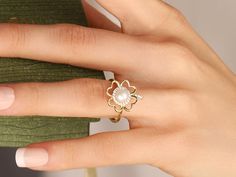 Pearl Clover Ring I'm sure this very elegant ring, decorated with gold, pearl and zircon stones, will bring you a lot of luck.  Your friend to whom you gifted a 4-leaf clover ring is already very lucky. Because he has you. PRODUCT INFORMATION DETAİLS *Metal Type: Solid 8K/14K/18K (White/Yellow/Rose) Gold *Center Gemstone: White (Pearl quality freshwater pearls with very high luster and smooth surface.) *Pearl Size: 6.5 mm *Ring Weight: 2 Gram *Side Stone: 1.10 mm *Upper Part Width: 17mm DIAMOND Lucky Ring, Lucky Leaf, Handmade Gold Ring, Clover Ring, Floral Ring, Four Leaves, Leaf Ring, Elegant Ring, Four Leaf