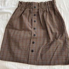 Checkered Skirt Perfect For Fall, Never Worn! Trendy Brown Cotton Skirt, Casual Brown Mini Skirt For Work, Retro Brown Skirt With Pockets, Casual Plaid Pencil Skirt, Brown Skirt With Button Closure For Summer, Brown Button Closure Skirt For Summer, Fall Mini Length Brown Skirt, Trendy Brown Skirt With Button Closure, Brown Pencil Skirt With Pockets