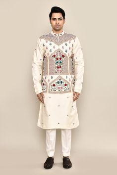 Ivory bundi with thread, sequin embroidery in mughal floral pattern. Paired with floral embroidered kurta and pant pyjama. - Aza Fashions Fitted White Bollywood Nehru Jacket, White Fitted Bollywood Nehru Jacket, Fitted White Nehru Jacket With Zari Work, White Fitted Nehru Jacket With Zari Work, Designer Off-white Bandhgala With Cutdana, White Bandhgala With Cutdana For Reception, White Bandhgala With Intricate Embroidery For Festive Occasions, Festive Off-white Bandhgala With Intricate Embroidery, Festive White Bandhgala With Intricate Embroidery