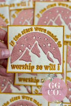 someone is holding up a patch that says, we were made to worship so will i worship