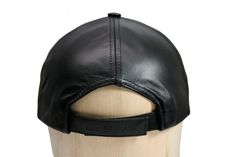 A signature item, the all-time great classic baseball cap in genuine cowhide leather. Structured backing allows it to keep its shape. The USA embossed hook and loop closure allows adjustable fit for most. Available in many colors, it is perfect for wear in any occasion with any outfit. Made in New York, USA. Adjustable Leather Flat Cap Baseball Cap, Casual Leather Snapback Hat With Curved Brim, Adjustable Leather Flat Cap, Adjustable Leather Baseball Cap With Leather Patch, Leather Snapback Hat For Streetwear, Casual Leather Baseball Cap With Leather Patch, Black Leather Adjustable Snapback Hat, Black Leather Snapback Hat, Casual Leather Baseball Cap With Curved Brim