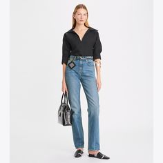 The new shape of denim, as seen in our Spring/Summer 2023 show. An editors' favorite from the runway, our mid-rise slim jean has a waist-defining rise and falls straight from hip to hem. A subtle crease against the light wash elongates the leg. An effortless wardrobe essential to wear every day. Summer Chic Jeans With Straight Hem, Chic Summer Jeans With Straight Hem, Chic Straight Hem Summer Jeans, Summer Workwear Jeans With Straight Hem, Chic Mid-rise Jeans For Business Casual, Spring Business Casual Straight Fit Jeans, Chic Straight Leg Jeans, Chic Straight Fit Jeans, Elegant Straight Leg Summer Jeans