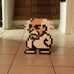 an image of a paper mario on the floor