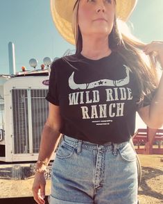 Saddle up cowgirl and lasso in our Wild Ride Ranch western graphic tee for women. Wild Ride Ranch western graphic tee by Ali Dee features a unisex fit body in black with white screen printed art. Sizes: S-3XL Chart in inches: Western Style T-shirt For Ranch In Summer, Pre-shrunk T-shirt For Western-themed Summer Events, Fitted Crew Neck T-shirt For Rodeo, Western Style Summer T-shirt, Western Style Relaxed Fit Graphic T-shirt, Western Style Relaxed Fit T-shirt With Graphic Print, Black Top For Spring Rodeo, Casual Cow Print T-shirt For Summer, Crew Neck T-shirt For Western-themed Spring Events