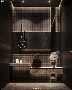 the interior of a bathroom with dark walls and flooring, including a large mirror on the wall