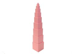 a tall pink building made out of lego blocks