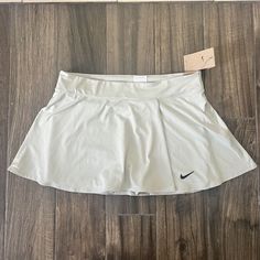 Nike Tennis Standard Fit Skirt Gray Ish Blue Size Xl Please Check Pictures For Any Measurements The Color Has A Hint Of Blue But Also Gray Spring Swim Skirt With Pockets, Casual Nike Fitted Tennis Skirt, Nike Pleated Tennis Skirt For Spring, Nike Spring Pleated Skirt, Nike Fitted Tennis Skirt For Spring, Nike Pleated Skort For Spring, Nike Summer Pleated Skirt, Nike Tennis Skirt For Spring, Nike Pleated Skirt For Summer