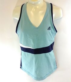 Condition:  Brand new, never worn Adidas workout shirt.  Style:  Adidas Fund Workout Tank Climalite top.  Colors: Splash blue in color with navy blue.  Description:   Adidas workout tank has a bra top built in and ClimaLite moisture wicking fabric.  This shirt has the adidas logo on the front left. 100% synthetic tee.  Shipping info:   $ FREE SHIPPING WITHIN THE USA AND TO MILITARY APO/FPO BOXES / $40 CAN/ International e-mail for exact charge. Womens Adidas, Workout Tanks, Bra Top, Blue Shirt, Adidas Logo, Moisture Wicking Fabric, Bra Tops, Adidas Women, Workout Shirts