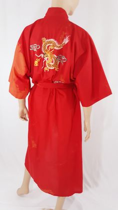 "Dragon Kimono Robe Women's Mens Red Tie Dye Colorful Embroidered Dragon Pockets Belted Excellent Condition Vintage by PLUM BLOSSOM Size M Modern robe take on kimono. Gorgeous calf length robe with colorful embroidered dragon on back and pockets. Gorgeous red and deep orange tie dye fabric, wide sleeves, with belt and front pockets. In excellent condition. Easy to wear casual chic vintage for the disco sporting life. MEASUREMENTS: Length - 49\" Bust (underarms to underarms) - 26\"x2 Sleeve (shou Fitted Red Summer Kimono, Traditional Red Summer Kimono, Traditional Red Kimono For Summer, Traditional Red Cotton Kimono, Traditional Red Embroidered Kimono, Festive Red Embroidered Kimono, Dragon Kimono, Red Tie Men, Robe Women's