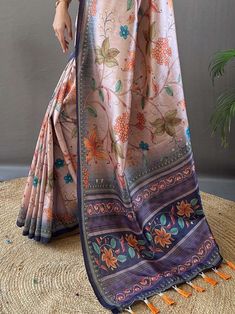 This stunning saree features a beautiful combination of peach and blue colors, adorned with intricate kalamkari print work that adds a traditional touch to the ensemble. The saree also comes with attached tassels on the pallu, adding a playful yet fashionable element to the overall look.
Crafted from high-quality silk fabric, this saree exudes a luxurious feel and drapes beautifully on the body. The similar color silk material blouse complements the saree perfectly, making it a complete traditio Engagement Gown, Kalamkari Print, Lehenga Crop Top, Lehenga Choli Wedding, Floral Lehenga, Reception Gown, Bollywood Lehenga, Cocktail Wear, Traditional Saree