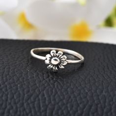 Stackable Flower Ring For Anniversary, Anniversary Stackable Flower Ring, White Gold Flower Cluster Promise Ring, Classic White Gold Flower-shaped Ring, Adjustable Flower Rings For Anniversary, Silver Flower Rings With Adjustable Fit, Adjustable Flower Shaped Anniversary Rings, Adjustable Round Flower Ring In Fine Jewelry Style, Sterling Silver Flower Ring For Wedding