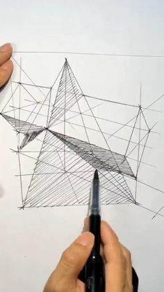 two hands are drawing an abstract structure on paper with marker and pencil, while another hand is holding a pen in the foreground