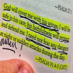 a hand holding a piece of paper with writing on it and the words god will cover me with his wings, i will be safe in his care