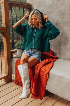 -Falling leaves and lattes, please! Cozy up by the fire in this must- have boho knit sweater! -Cable knit sleeves - Jacquard floral pattern trim accents -V-cut neckline - Hood - Wide Sleeve -Relaxed silhouette Measurements S : Bust 52", Hip 52", Length 20", Sleeve Length 18", Waist 52". M : Bust 54", Hip 54", Length 20", Sleeve Length 18", Waist 54". L : Bust 56", Hip 56", Length 21", Sleeve Length 18.5", Waist 56". Cozy Green Cable Knit Sweater, Green Soft Knit Sweater For Cold Weather, Cozy Knitted Hoodie For Fall, Cozy Green Textured Knit Sweater, Cozy Chunky Knit Hoodie, Cozy Green Sweater For Cold Weather, Cozy Green Sweater For Fall, Cozy Knit Hoodie For Fall, Cozy Green Fall Sweater