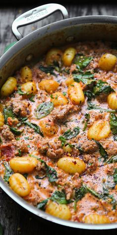 Creamy Italian Sausage Gnocchi with Spinach and Tomato Sauce in a stainless steel pan Gnocchi With Tomato Cream Sauce, Gnocchi Tomato Cream Sauce, Jamie Oliver Recipes 30 Minute Meals, Tuscan Sausage Gnocchi, Creamy Sausage Gnocchi, Gnocchi With Spinach, Tuscan Sausage, Sausage Gnocchi, Pasta Sausage