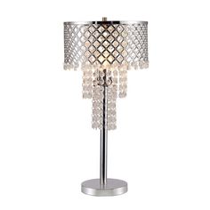 a lamp that is sitting on top of a metal stand with beads hanging from it