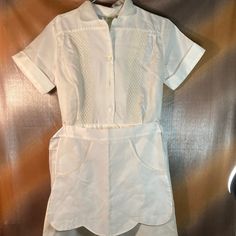 Vintage 1940’s Nurse Or Waitress Uniform. Servicette. Size 14. 38” Bust. 27” Waist. With Separate Apron. Has Some Stains. Unlaundered. Q 70s Nurse Uniform, Classic White Vintage Dress With Short Sleeves, 1950s Collared Daywear Dresses, 1950s Collared Day Dresses, Classic Short Sleeve Dress For Vintage Events, White Vintage Dress With Short Sleeves And Lining, Classic Short Sleeve Vintage Dress For Vintage Events, Classic Short Sleeve Lined Vintage Dress, Classic Lined Vintage Dress For Daywear