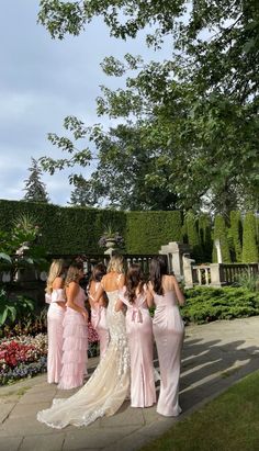 the bridesmaids are getting ready to walk down the aisle