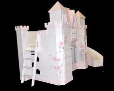 a paper model of a white castle with stairs and flowers painted on it's walls