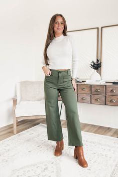 Get ready to press play on your Fall fashion with these olive green pants! The wide leg fit adds a touch of drama to your outfit, making it perfect for any occasion. Don't miss out on adding some fun to your wardrobe with these pants! Model is 5'5 wearing a size small S 0-2, M 4-6, L 8-10 95% Rayon, 5% Spandex High-waisted Wide leg fit Front pockets detail Button & zipper closure Spring Khaki Wide Leg Full-length Pants, Green Full-length Bottoms For Fall, High Waist Green Wide Leg Pants For Fall, Green Wide Leg Pants For Fall, Green High-waisted Wide Leg Pants For Fall, Green Full Length Bottoms For Fall, Olive Wide Leg Pants For Spring, Olive High-waisted Pants For Spring, Chic Olive High Waist Bottoms