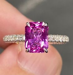 ALL THESE PHOTOS WERE TAKEN WITH AN ORDINARY IPHONE & HAVE NOT BEEN EDITED OR ENHANCED IN ANY WAY. Up For Sale is a Stunning Super Fine Natural Vivid Pink Sapphire & Pave' Diamond Ring in Solid 18K White Gold. This Ring was made by us Here in New York City & is of the Finest Quality. The Center Stone is an Exceptional Natural Certified 2.12 Ct Radiant Cut Hot Pink Sapphire that measures approx 8.3 x 6.2 mm & was Mined in Ceylon (Sri Lanka.) It Has Incredible Color a Super Vibrant, Juicy Hot Pink Hue with Vivid Saturation & a Medium Tone. The Color is Bright, Bold & Has a Ton of Pop. It Has a Masterfully Executed Precision Radiant Brilliant Cut & is a Very Reflective GEM. It Has Excellent Clarity & is 100% Clean to the eye. It is a Super Lively Sapphire that is Full of Brilliance, Fire, Spa Hot Pink Engagement Ring, Pink Sapphire Jewelry, Pink Engagement, Gold Ring Engagement, Vvs Diamond, Modern Engagement Rings, Pink Sapphire Ring, Pave Diamond Ring, Framed Maps