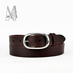 "To choose your buckle, make a selection from the drop-down menu, and the picture will change to match. This warm brown leather belt has a narrow 1\" (25mm) profile making it highly versatile.  Easily fitting both jeans and formal trousers, this luxurious skinny belt also makes a neat waist belt to cinch in dresses and coats. Carefully hand crafted from Italian vegetable tanned leather by a member of our small team at our London workshop;  these belts are constructed with press studs to enable buckle swapping, making for an even more unique and versatile accessory. Featuring a matching keeper, tapered tip and a foil stamped logo on the inside of the belt - we've kept the design clean, minimal and functional.   Stamped crisply next to our logo, you'll notice our 25 year Warranty Snips - gua Classic Brown Belt Buckles With Silver Buckle, Adjustable Brown Belts With Silver Buckle, Adjustable Brown Belt With Silver Buckle, Brown Adjustable Belt With Silver Buckle, Classic Brown Belts And Suspenders For Everyday, Adjustable Brown Belt Buckles For Business, Leather Belt Crafts, Jeans Formal, Womens Belt