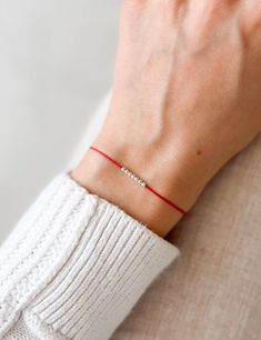 Minimalist Silk Wish Bracelet With Chosen Number Of Beads Make a wish and put this bracelet on your wrist. Wear this minimalist red string bracelet as a symbol of protection and good fortune. The Red String is an ancient Kabbalah tradition believed to ward off negative energy and provide a powerful layer of protection against the evil eye. Details: ✦ 2mm delicate beads ✦ Natural waterproof silk cord in red ✦ Adjustable bead so it fits perfectly on your wrist ✦ Beautifully packaged, ready for gif Minimalist Bracelet With Sliding Knot For Best Friend, Minimalist Sliding Knot Bracelet For Best Friend, Minimalist Red Beaded Bracelets For Everyday, Red Minimalist Beaded Bracelets For Everyday, Simple Bracelets With Sliding Knot As Gift, Simple Bracelets With Sliding Knot For Gift, Minimalist Resizable Beaded Bracelets As A Gift, Minimalist Red Beaded Bracelets As Gift, Red Minimalist Beaded Bracelet Gift