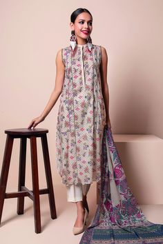 Khaadi L22112 Beige Spring Summer 2022 Off White Floral Print Sets For Summer, Off White Floral Print Sets For Spring, Off-white Floral Print Sets For Summer, Spring Off White Floral Print Sets, Beige Cotton Lawn Suit For Summer, Silk Lawn Suit With Floral Print For Summer, Elegant Multicolor Lawn Suit For Spring, Unstitched Patterned Lawn Suit For Summer, Summer Silk Lawn Suit With Printed Motifs