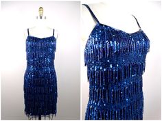 "This is an AMAZING vintage dress beautifully detailed with beading and in excellent condition! Bust - 32\"  Waist - 28\" Hips - 36\" Length - 35\" This dress comes from a pet-free and smoke-free home. If you would like more info or have any questions, please don't hesitate to ask!" Sequin And Fringe Dress, Blue 1920s Dress, Fitted Blue Dress With Beaded Fringe, Elegant Blue Dress With Beaded Fringe, Blue Fringe Dress, Art Outfit, Sequined Dress, 1920s Dress, Stunning Gowns