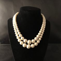 This listing is for a beautiful two strand necklace!  The necklace is made with white pearl beads in a graduated size.  It has silver tone details, hook clasp, and is signed Japan. Size:  Approximately 13" to 14" with an additional 2" extension Condition:  Good condition for being vintage Want to purchase 3 or more items from my shop?  Please use the following coupon when you check out to receive 20% off! https://www.etsy.com/shop/elsysvintage?coupon=ELSYSDISCOUNT *Please be aware the items I am selling are vintage, which means they are old and with anything old there will be some wear due to their age.  I try to photograph and describe the items I sell as good as I possibly can.  If you have any questions please feel free to contact me. Please check out my other items at:  www.etsy.com/sh 1950s Wedding, Hook Clasp, Multi Strand Necklace, Strand Necklace, White Pearl, Multi Strand, Pearl Beads, Pearl White, Jewelry Gift