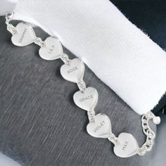 Create your own bracelet with words meaningful to Grandma with our Engraved Heart Link Bracelet For Grandma. Whether a clever message or words and dates, this bracelet makes a stylish accessory.   𝘼𝙗𝙤𝙪𝙩 𝙩𝙝𝙚 𝙄𝙩𝙚𝙢:  - Lobster claw closure  - Measures 7.5" in length  - Constructed of rhodium plated zinc  - Bracelet features 6 heart shaped engravable discs Grandma Mothers Day Gift, Gift Bracelet, Nana Gifts, Gift For Grandma, Gift Jewelry, Grandma Gifts, Chain Link Bracelet, Bracelet Gift, Stylish Accessories