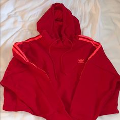 Never Worn Before Adidas Cropped Hoodie. Love This Color! This Is Size Small. Red Hoodie With Double-lined Hood For Fall, Red Fall Hoodie With Double-lined Hood, Red Hooded Hoodie With Double-lined Hood, Red Double-lined Hoodie, Red Hooded Hoodie For Fall, Trendy Red Hoodie For Winter, Red Hoodie With Drawstring Hood, Red Fall Sweatshirt With Adjustable Hood, Red Hooded Sweatshirt With Double-lined Hood